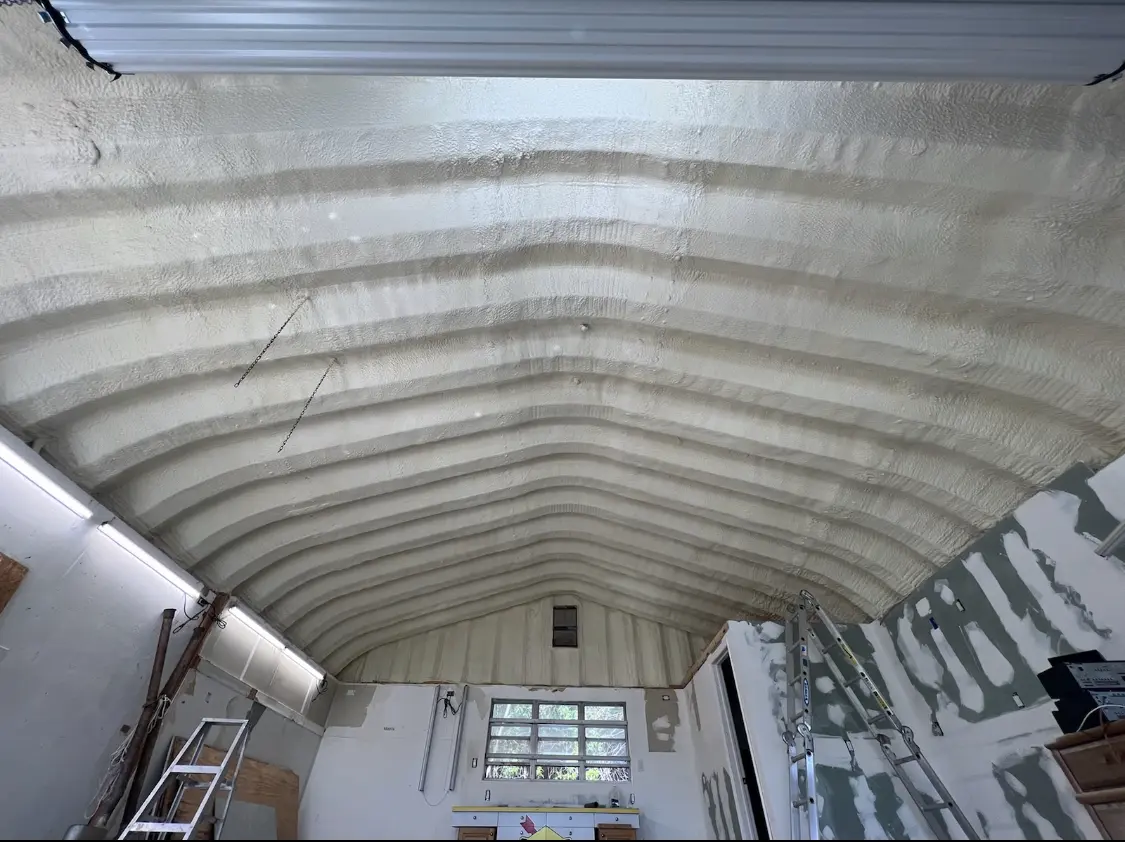 Spray polyurethane foam applied to the underside of a metal roof deck in Cuyahoga Falls